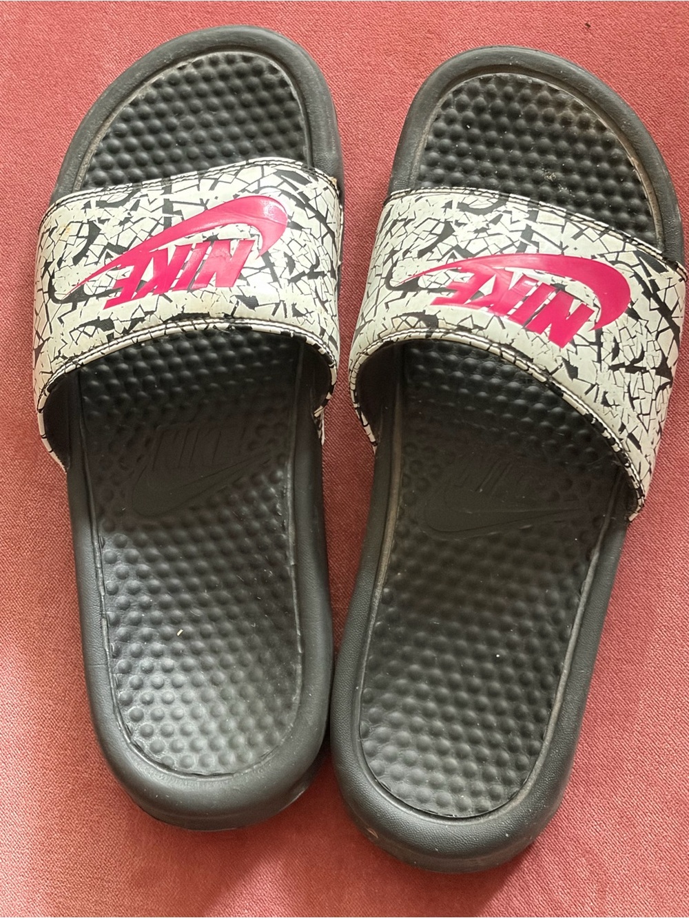 Nike Black Slides with White Cracked Strap and Pink Logo